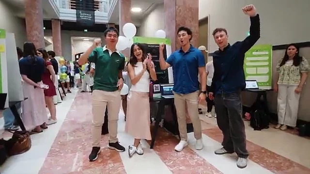 A team celebrating at the EIA 2026 expo