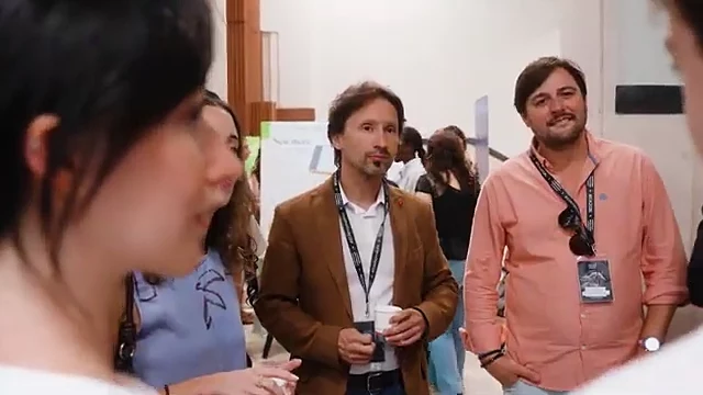 Mentors talking with a founder